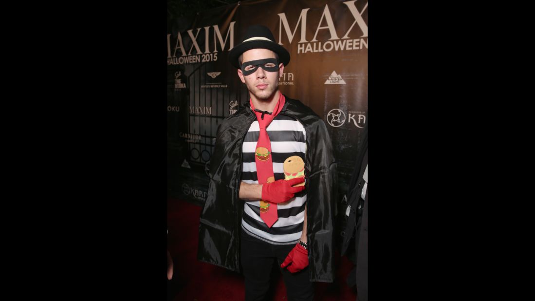 Nick Jonas showed up at the Maxim Halloween Party on Saturday, October 24, dressed as his criminal alter ego, the Hamburglar.