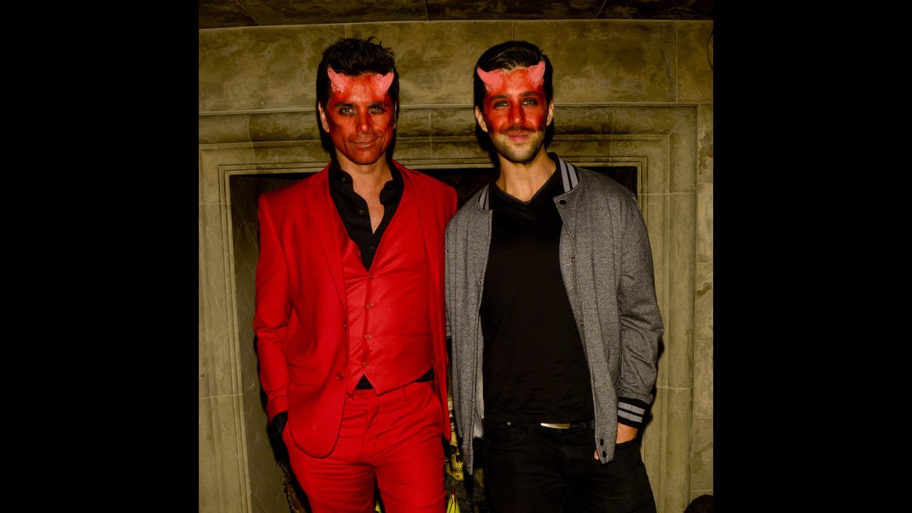 Devilish duo John Stamos and Josh Peck attend Carlton's Halloween Nightmare! on October 24 in Beverly Hills.
