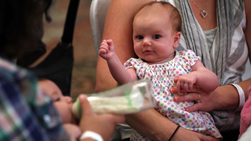 SPRINGFIELD, VA - AUGUST 21:  Eight-week-old Eleanor Delp attends a "What to Expect" baby shower with her mother August 21, 2012 in Springfield, Virginia. The DC Metro Chapter of Operation Homefront held the event, with parenting and pregnancy workshops, to celebrate with 100 new and expecting military mothers representing each branch of service from DC, Maryland and Northern Virginia.  (Photo by Alex Wong/Getty Images)