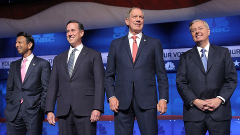 From left, Bobby Jindal, Rick Santorum, George Pataki and Lindsey Graham take the stage for the second-tier GOP debate that took place before the main event at the University of Colorado.
