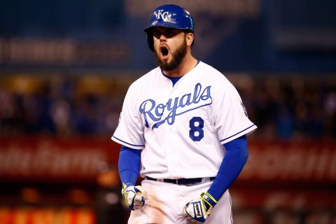 Mike Moustakas of the Royals celebrates after hitting an RBI single to score teammate Eric Hosmer in the fifth inning.