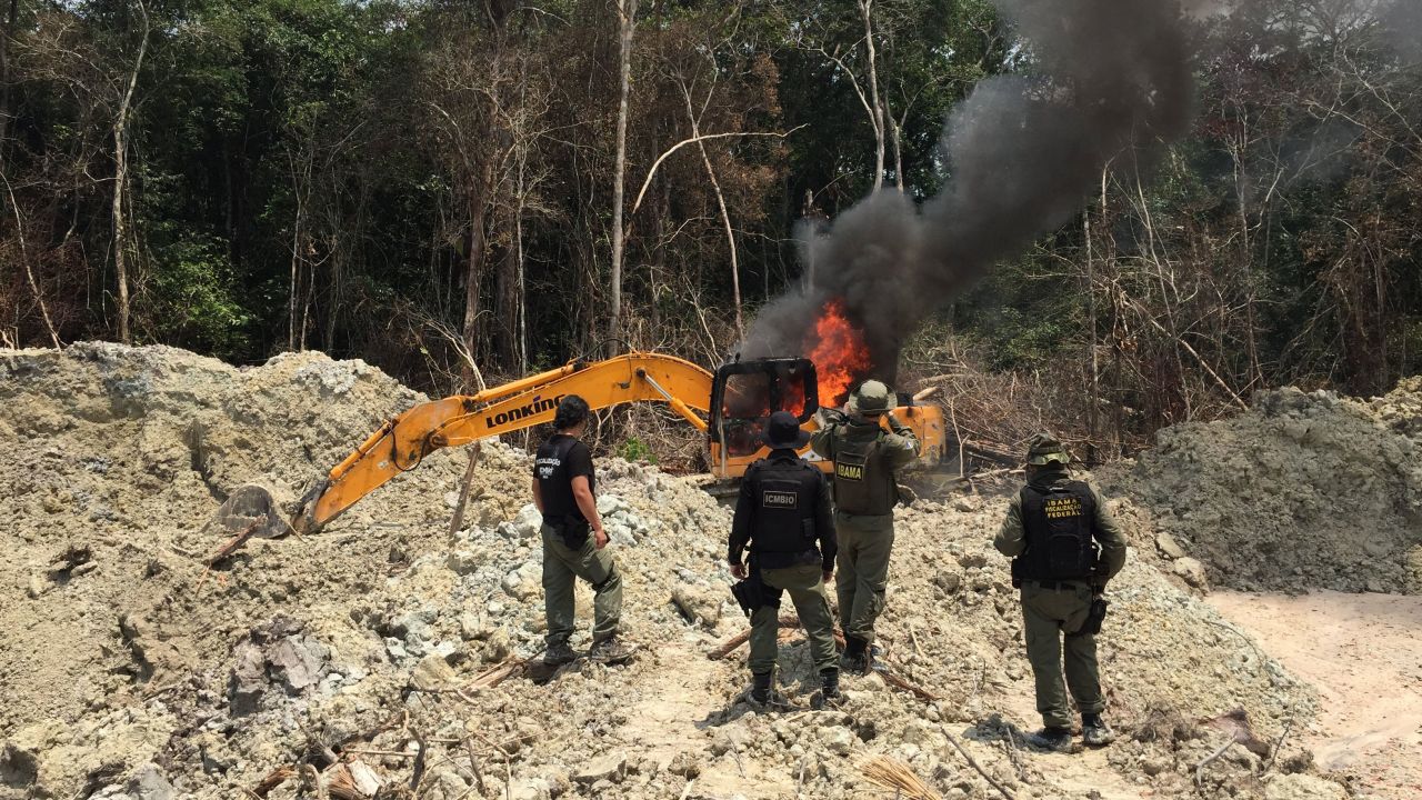 IBAMA agents set fire to a suspected illegal mining camp in Brazil's northern Para state.