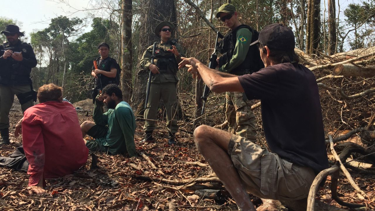 Agents with IBAMA, Brazil's environmental protection agency, raid a suspected illegal gold mine.