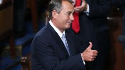 Outgoing Speaker of the House John Boehner (R-OH) gives a thumbs up to fellow members of the U.S. House of Representatives on the floor of the House chamber October 29, 2015 in Washington, DC.