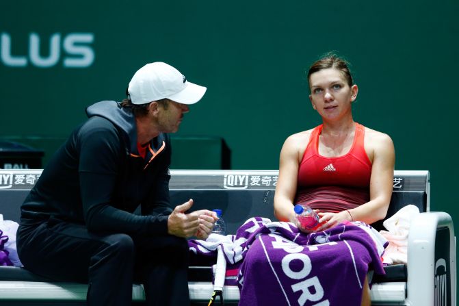 A frustrated Halep, seen here with coach Darren Cahill, fell 7-6 (7-5) 6-1. The Romanian was the highest ranked player in the field at No. 2. 