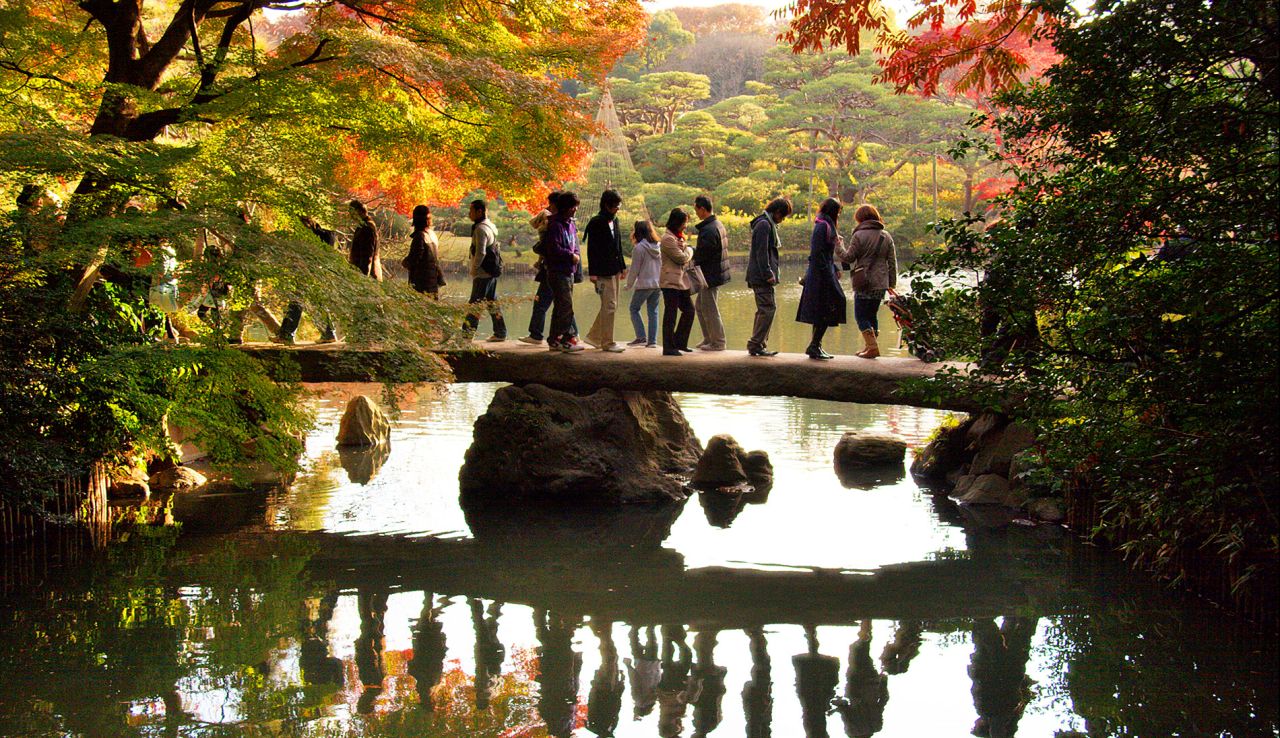 Rikugien Gardens in Tokyo are ablaza in fall color. Fall equinox is a national holiday in Japan.