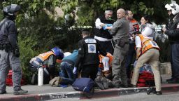 Israeli security forces and emergency personnel attend to an Israeli victim of a Palestinian stabbing attack in Jerusalem on October 30. A Palestinian stabbed two Israelis in Jerusalem before being shot, police and the army said, in the first knife attack in the city in two weeks.