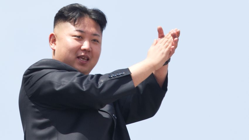North Korean leader Kim Jong-Un (L) applauds during a military parade in honour of the 100th birthday of the late North Korean leader Kim Il-Sung in Pyongyang on April 15, 2012.  North North Korean leader Kim Jong-Un delivered his first ever public speech at a major military parade in Pyongyang to mark 100 years since the birth of the country's founder Kim Il-Sung.    AFP PHOTO / Ed Jones (Photo credit should read Ed Jones/AFP/Getty Images)