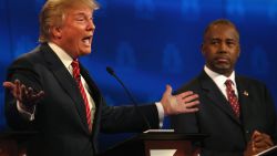 BOULDER, CO - OCTOBER 28:  Presidential candidates Donald Trump (L) speaks while Ben Carson looks on during the CNBC Republican Presidential Debate at University of Colorados Coors Events Center October 28, 2015 in Boulder, Colorado.  Fourteen Republican presidential candidates are participating in the third set of Republican presidential debates.  (Photo by Justin Sullivan/Getty Images)
