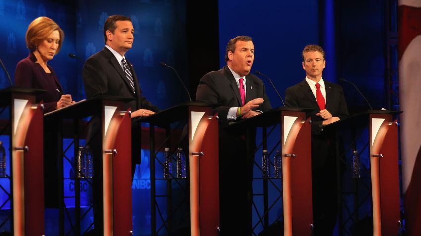 Presidential candidate New Jersey Gov. Chris Christie (2nd R) speaks  while Sen. Rand Paul (R) (R-KY), Carly Fiorina (L), and Sen. Ted Cruz (R-TX) look on during  the CNBC Republican Presidential Debate at University of Colorados Coors Events Center October 28, 2015 in Boulder, Colorado. 
