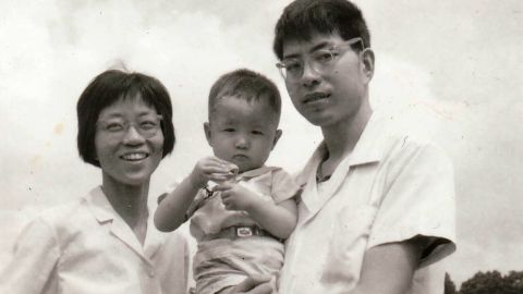 CNN's Steven Jiang aged about 2 with his mom and dad,  Jane Zhang and Zhaorong Jiang.