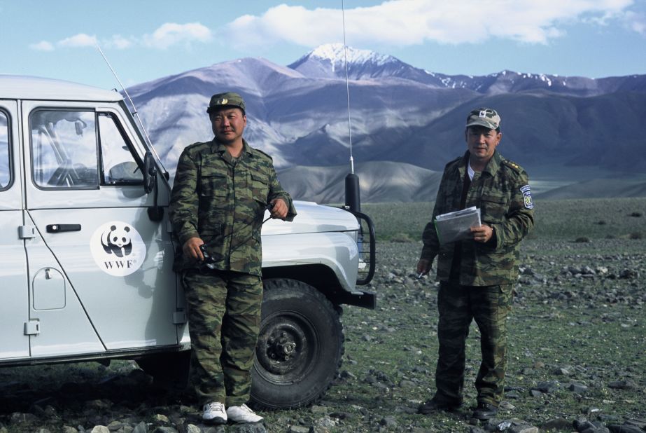 World Wildlife Fund's snow leopard anti-poaching brigade in Mongolia's Turgen Reserve. The Tsagaan Mountains -- another snow leopard reserve -- are in the background.  