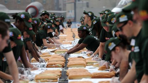 Served on a long roll, the submarine or "sub" sandwich is also known by other regional names, including hero (New York) and hoagie (Philly). Workers in New York City set a Guinness World Record in 2013 by making 2,706 hero sandwiches in an hour.