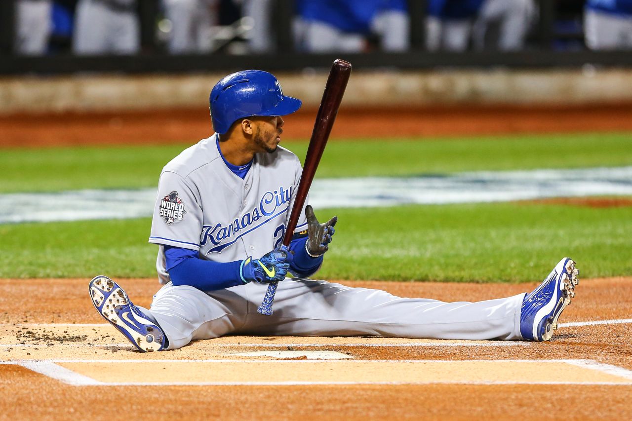 Royals shortstop Alcides Escobar sits in the batter's box after a pitch knocked him down.