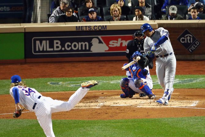 Royals catcher Salvador Perez hits a single.