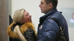 Relatives react after a Russian airliner with 217 passengers and seven crew aboard crashed, as people gather at Russian airline Kogalymavias information desk at Pulkovo airport in St.Petersburg, Russia, Saturday, Oct. 31, 2015. Russia's civil air agency is expected to have a news conference shortly to talk about the Russian Metrojet passenger plane that Egyptian authorities say has crashed in Egypt's Sinai peninsula.(AP Photo/Dmitry Lovetsky)