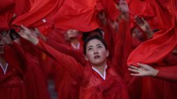 Dancers perform during a mass military parade at Kim Il-Sung square in Pyongyang on October 10, 2015. North Korea was marking the 70th anniversary of its ruling Workers' Party.  (Photo credit: ED JONES/AFP/Getty Images)