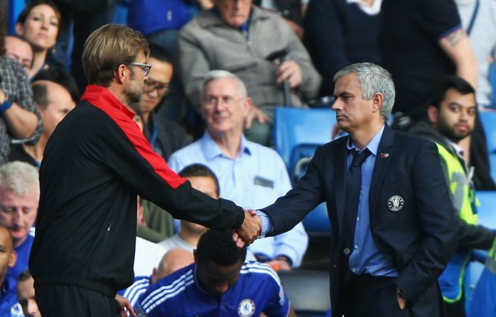 Liverpool manager Jurgen Klopp shakes hand with a glum Jose Mourinho after his team's superb victory. 