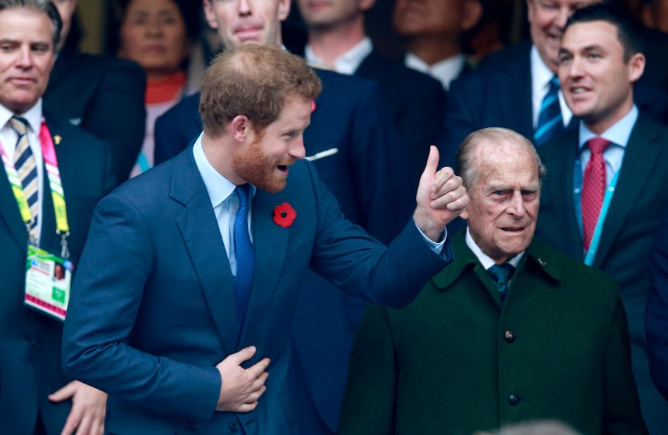 By Royal command. Prince Harry and the Duke of Edinburgh enjoyed the proceedings at Twickenham.