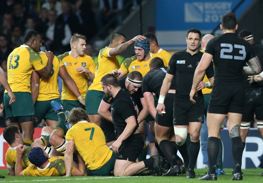 David Pocock of Australia is congratulated by his teammates after dragging his side back into the final with its first try. 