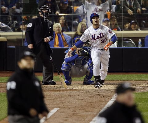The Mets' Michael Conforto watches his home run during the third inning.