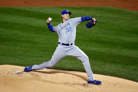 Chris Young of the Royals pitches in the first inning.