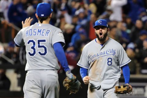 Eric Hosmer and Mike Moustakas of the Kansas City Royals react after defeating the New York Mets by a score of 5-3 to win Game 4 of the World Series in  New York on Saturday, October 31, 2015. The win put the Royals up to lead the series by three games to one.