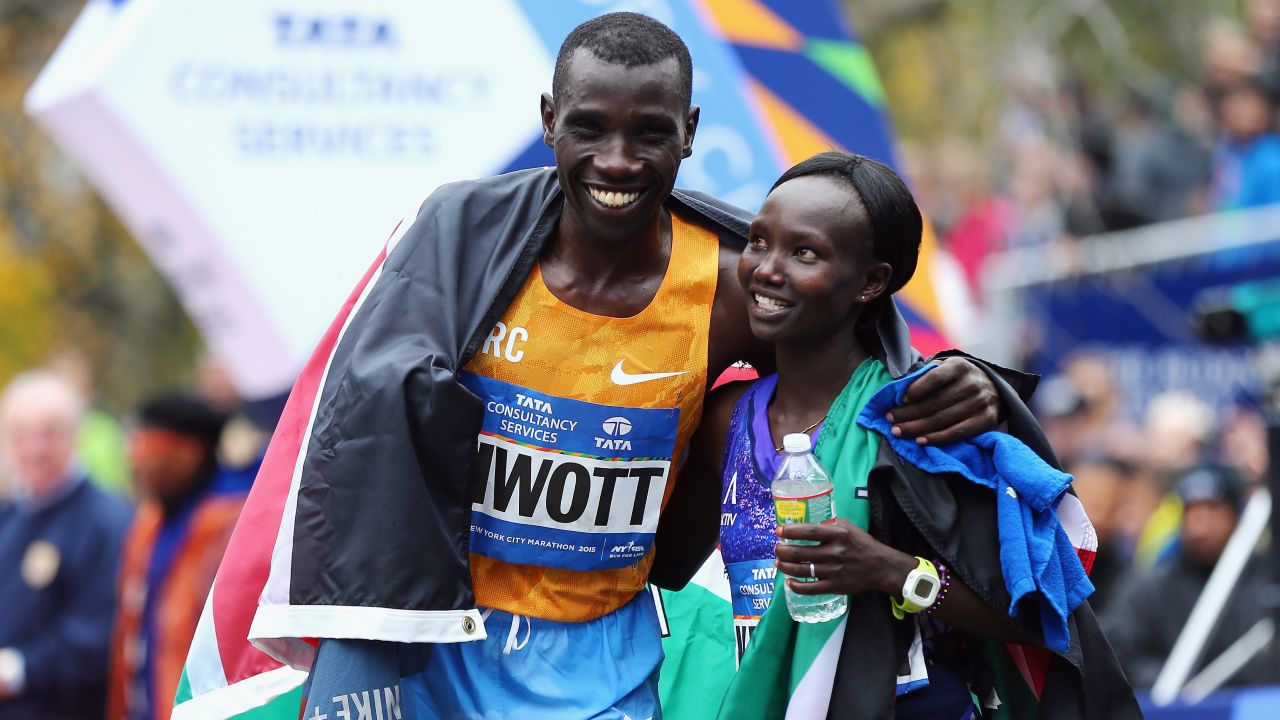 Pro Men's Division winner Stanley Biwott of Kenya, left, poses with Pro Women's Division winner Mary Keitany, <a href="http://bleacherreport.com/articles/2584896-new-york-marathon-results-2015-mens-and-womens-top-finishers?utm_source=cnn.com&utm_medium=referral&utm_campaign=editorial" target="_blank" target="_blank">also of Kenya</a>.
