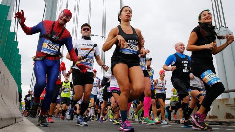 A costumed runner, like this Spiderman, is not an unusual sight amid runners.