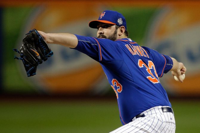 New York Mets Matt Harvey throws a pitch in the first inning against the Kansas City Royals.