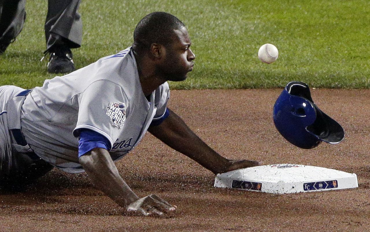 Kansas City Royals' Lorenzo Cain is safe after stealing second base against the New York Mets during the first inning.