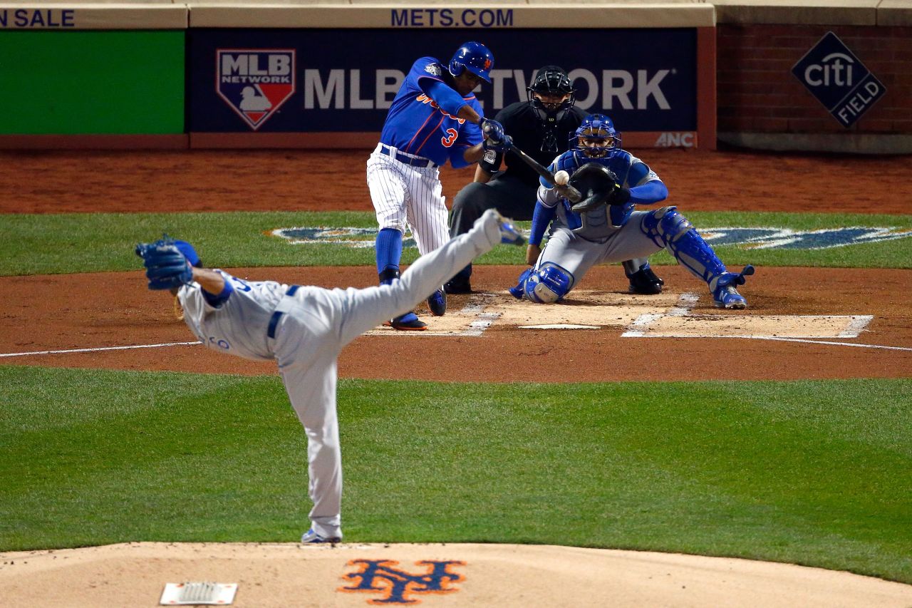 Curtis Granderson of the Mets hits a solo home run in the first inning.