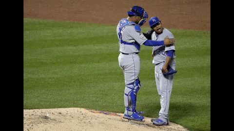 Kansas City Royals catcher Salvador Perez talks to pitcher Edinson Volquez during the sixth inning.