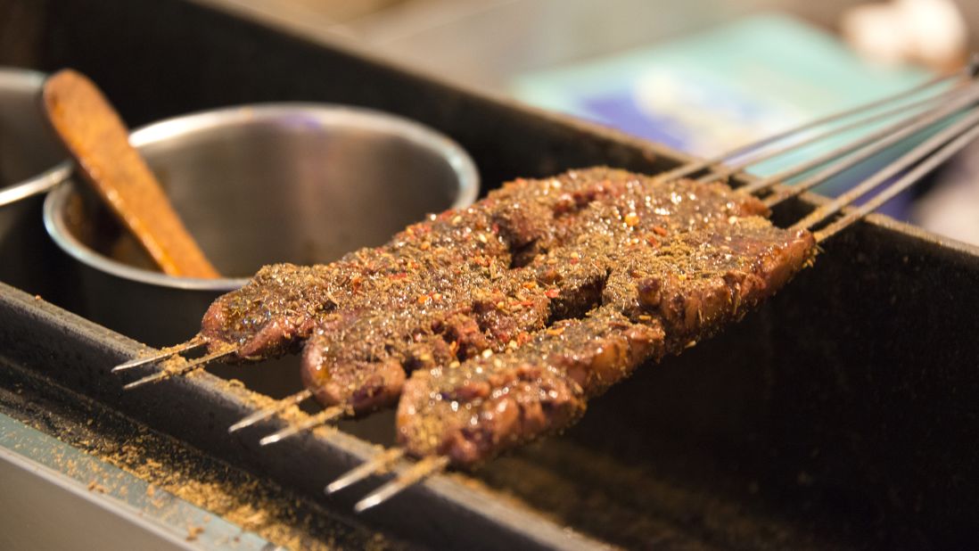 Coated with chili and cumin powder, it's a highly addictive midnight snack for Xi'an residents. It's not unusual for locals to order 100 of them in one go. 