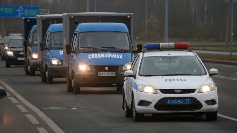 Trucks in St. Petersburg carry victims' bodies on Monday, November 2.