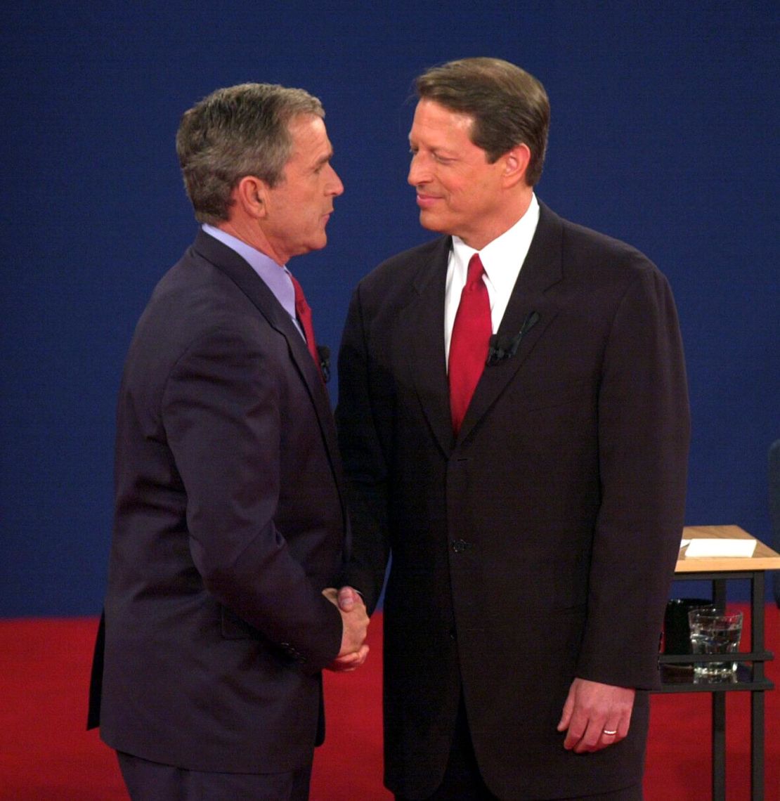 George W. Bush shakes hands with Al Gore after their third debate in October 2000.