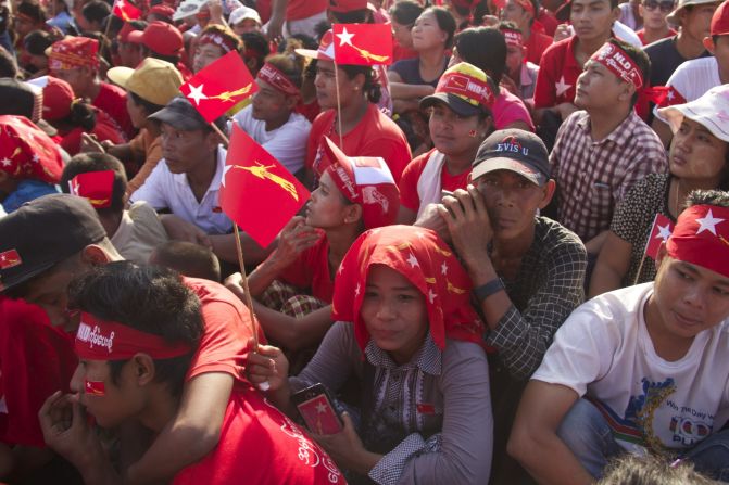 Supporters of the NLD cram the streets in a river of red shirts and flags during the November 1 rally.