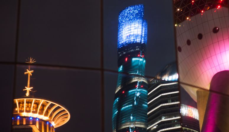 Standing at 632 meters (2,073 feet) tall, the newly completed Shanghai Tower (in the center) is the tallest skyscraper in China and the second highest in the world. When it fully opens, the tower is expected to include a 120th-floor observation deck and a 258-room five-star hotel. The J-Hotel, occupying floors 84-110, will become one of the world's highest hotels.<br /><em>Lujiazui Financial and Trade Zone, Pudong New Area, Shanghai</em>