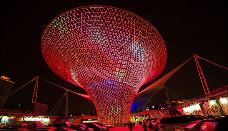 The Expo Axis (pictured here) is a construction built for the World Exposition Shanghai in 2010. It's reopened to the public as a <a href="index.php?page=&url=http%3A%2F%2Fwww.therivermall.com.cn%2F" target="_blank" target="_blank">shopping mall</a> in 2014. The site is lit up in colors and patterns of a Chinese flag during the country's National Day holidays.<br /><em>1368 Shibo Avenue, 168 Shangnan Road, Pudong New Area, Shanghai</em>