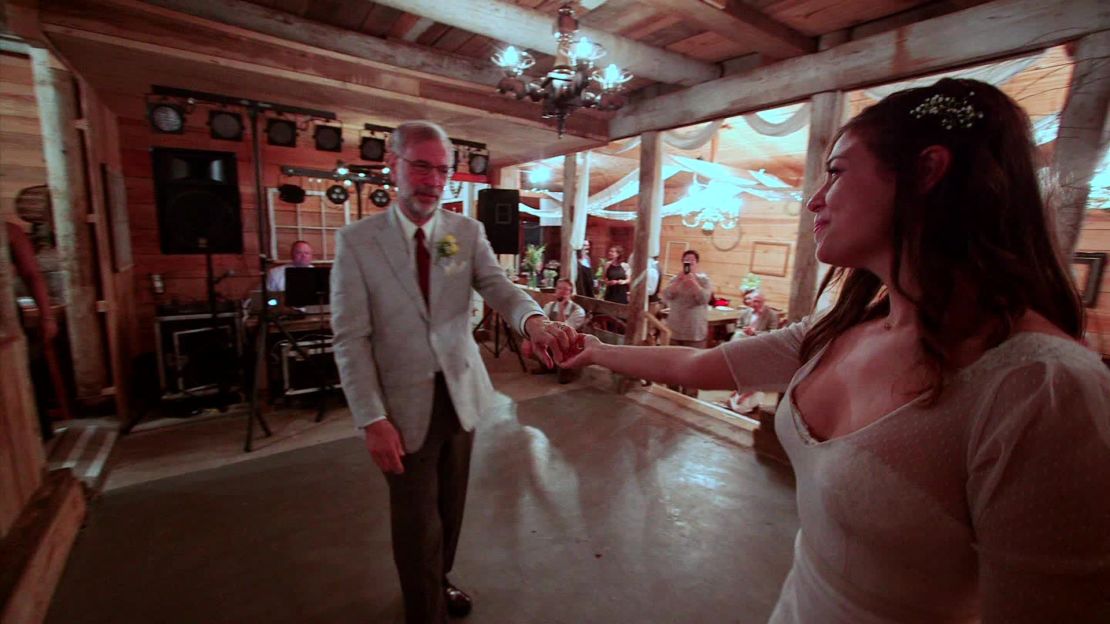 Sandy and Lauren dance at her reception to one of their favorite songs: "It's a Wonderful World" by Louis Armstrong. "Honestly, I have known since I was 5 what song I'm going to have with my first dance with my dad to," said Lauren.