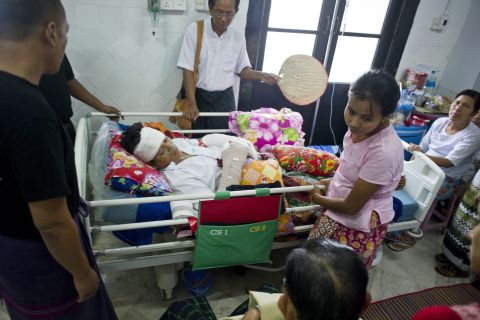 Naing Ngan Linn, a Myanmar opposition candidate and member of the parliament, is treated at the Yangon General Hospital on October 30, 2015. He suffered injuries from a machete attack while touring Yangon's Tharketa township on October 29.