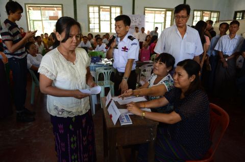 Local election officials conduct a voting day simulation in a school compound in Yangon on October 31 during a training session for volunteers, supervised by Union Election Commission (UEC) officials in preparation for the November 8 election.