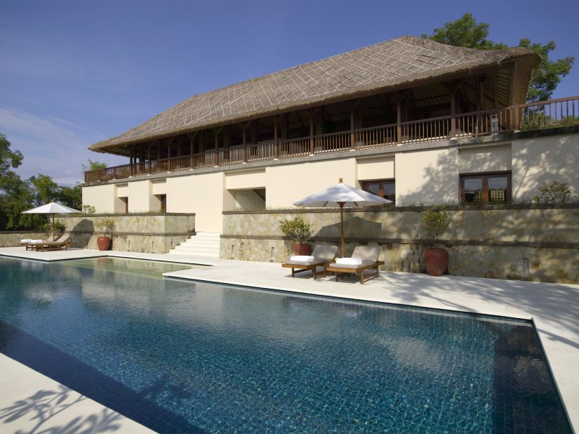 The rock star-worthy pool is surrounded by sun loungers and a sprawling wooden deck.