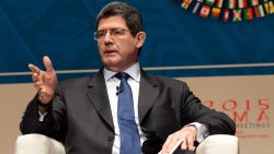 Brazilian Minister of Finance Joaquim Levy, takes part in a debate group moderated by British CNN news presenter Richard Quest, and with the co-participation of IMF Managing Director Christine Lagarde and Mark Carney Governor of the Bank of England (neither in picture), on the subject of Debate on the Global Economy during the World Bank Group and International Monetary Fund (IMF) Annual Meetings in Lima, Peru on October 8, 2015. AFP PHOTO/CRIS BOURONCLE (Photo credit should read CRIS BOURONCLE/AFP/Getty Images)