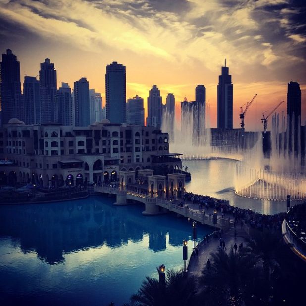 Schlappig spends an average four hours on a plane each day, takes at least one international flight per week, and doesn't like to spend more than three days in one place.<br /><br />Here, he takes a moment to enjoy a sunset water fountain show in Dubai. 