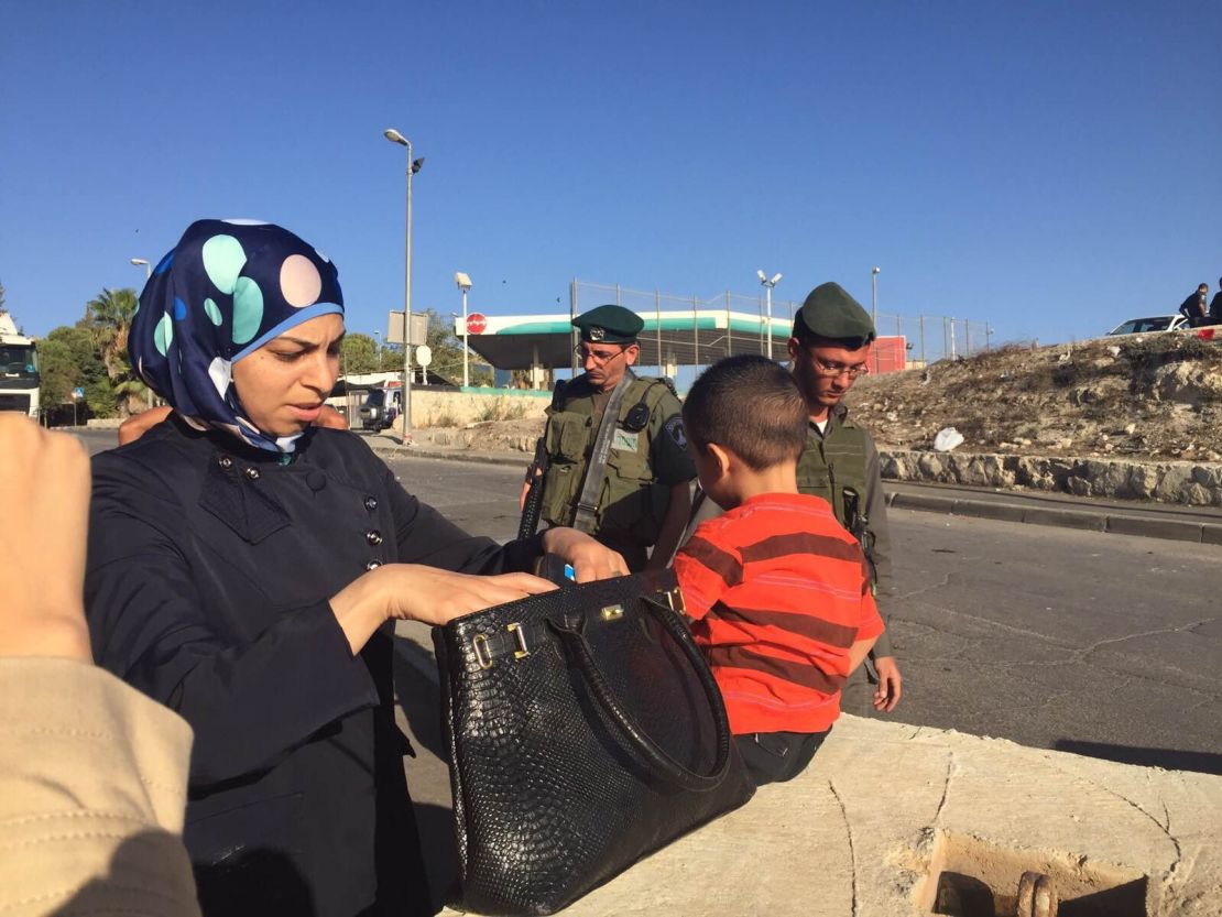 Israeli security forces check Palestinians in East Jerusalem.