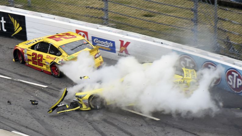 NASCAR drivers Joey Logano, left, and Matt Kenseth collide during the Sprint Cup race in Martinsville, Virginia, on Sunday, November 1. Logano was leading the race at the time and accused Kenseth of taking him out on purpose in retaliation for a wreck a couple of weeks ago. Kenseth acknowledged that the Martinsville wreck was his fault but blamed it on his car's poor handling. <a href="index.php?page=&url=http%3A%2F%2Fwww.foxsports.com%2Fnascar%2Fstory%2Fmatt-kenseth-joey-logano-martinsville-wreck-penske-joe-gibbs-racing-feud-kansas-chase-110115" target="_blank" target="_blank">See video of the incident</a>