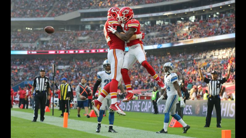 Kansas City teammates De'Anthony Thomas, right, and Brian Parker celebrate after Thomas scored a rushing touchdown against Detroit during an NFL game in London on Sunday, November 1. <a href="index.php?page=&url=http%3A%2F%2Fwww.cnn.com%2F2015%2F10%2F27%2Fsport%2Fgallery%2Fwhat-a-shot-sports-1027%2Findex.html" target="_blank">See 37 amazing sports photos from last week</a>