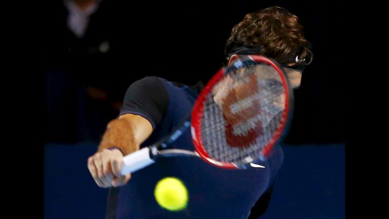Roger Federer returns the ball to Jack Sock during the semifinals of the Swiss Indoors on Saturday, October 31. Federer won the match and went on to defeat Rafael Nadal in the final.