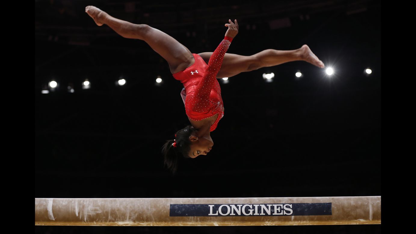 American Simone Biles competes on the balance beam at the World Gymnastics Championships on Thursday, October 29. For the third consecutive year, Biles won gold in the individual all-around.